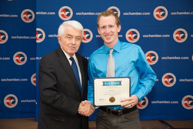 Nate receiving the Blue Ribbon Award for top 100 Small Businesses in the US